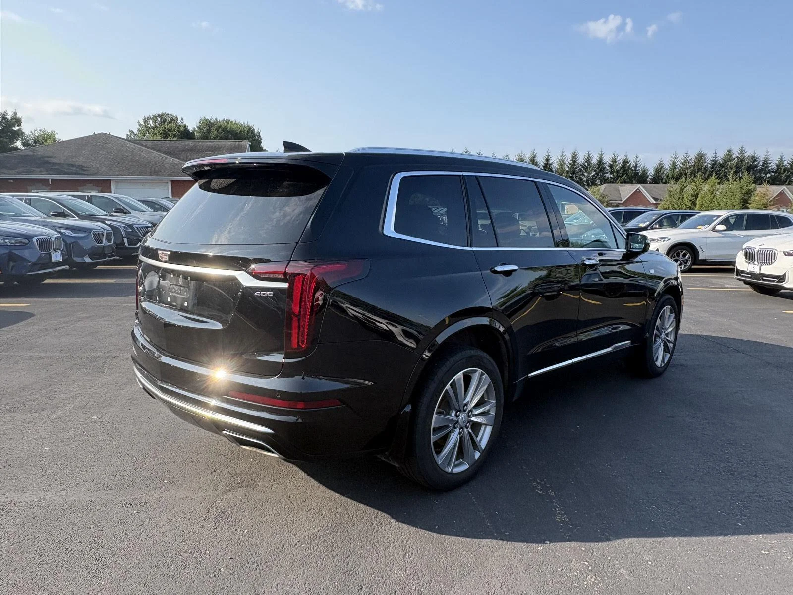Used 2024 Stellar Black Metallic Cadillac AWD Premium Luxury image 7