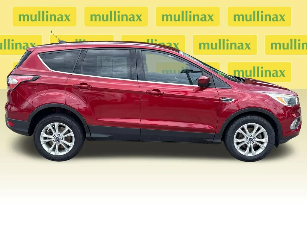 Used 2017 Ford Escape SE with VIN 1FMCU0GD6HUD56625 for sale in New Smyrna Beach, FL
