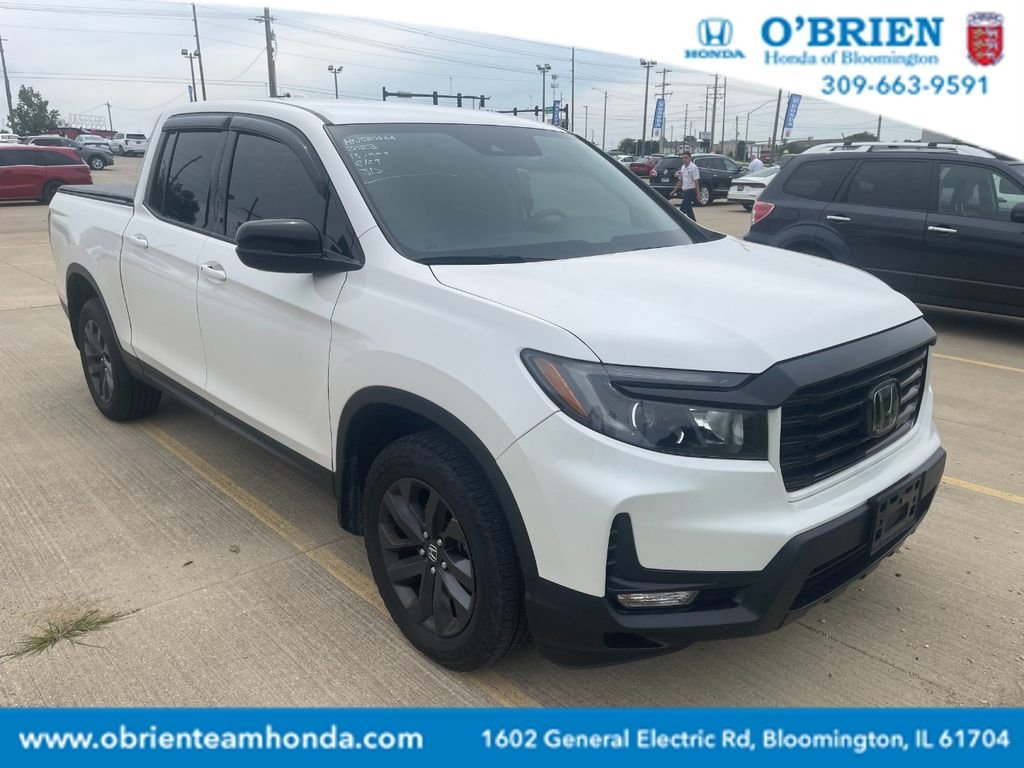 Used 2023 Platinum White Pearl Honda Sport image 1