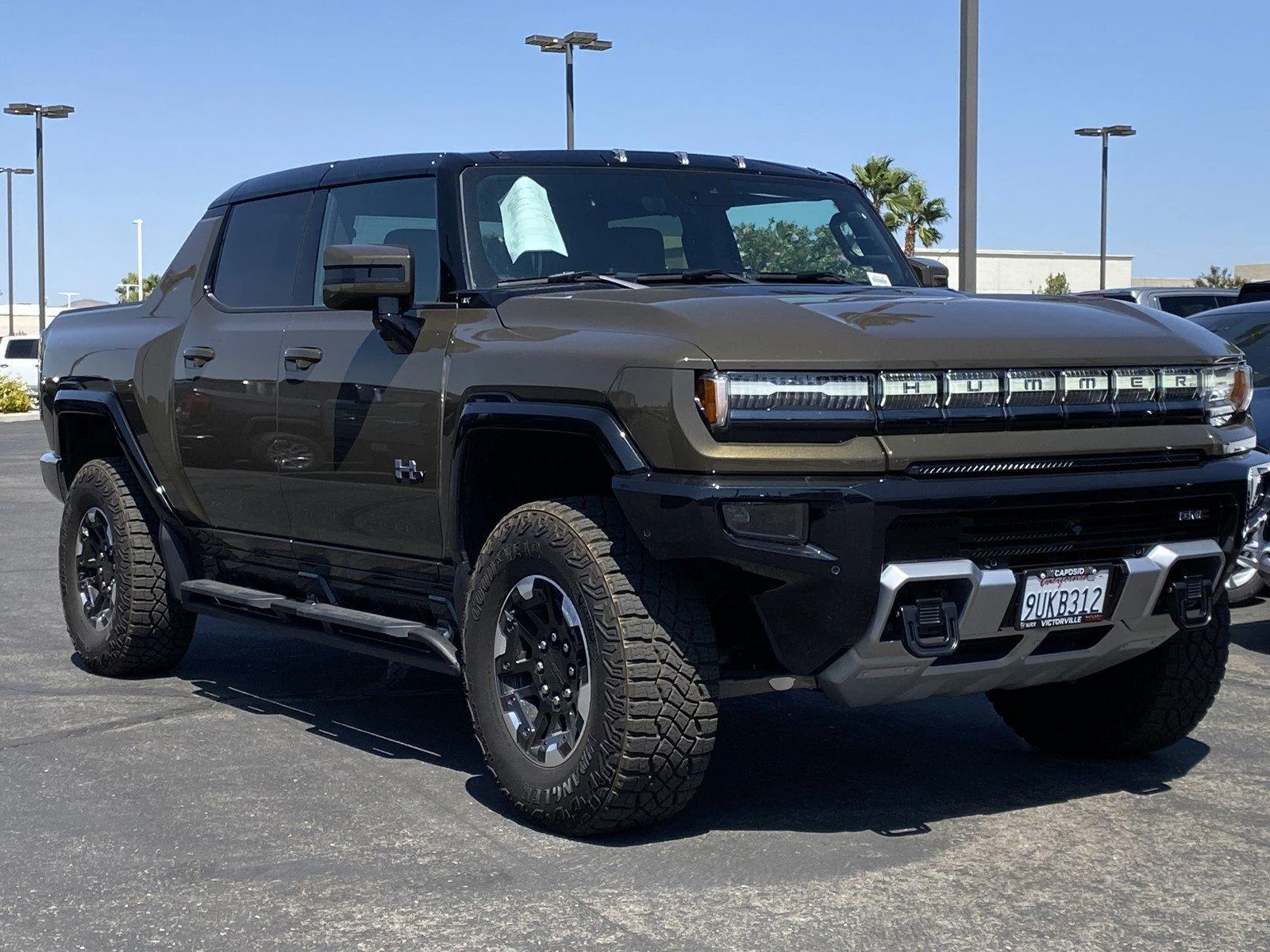 New 2025 Deep Aurora Metallic (Dark Bronze) GMC 3X image 1