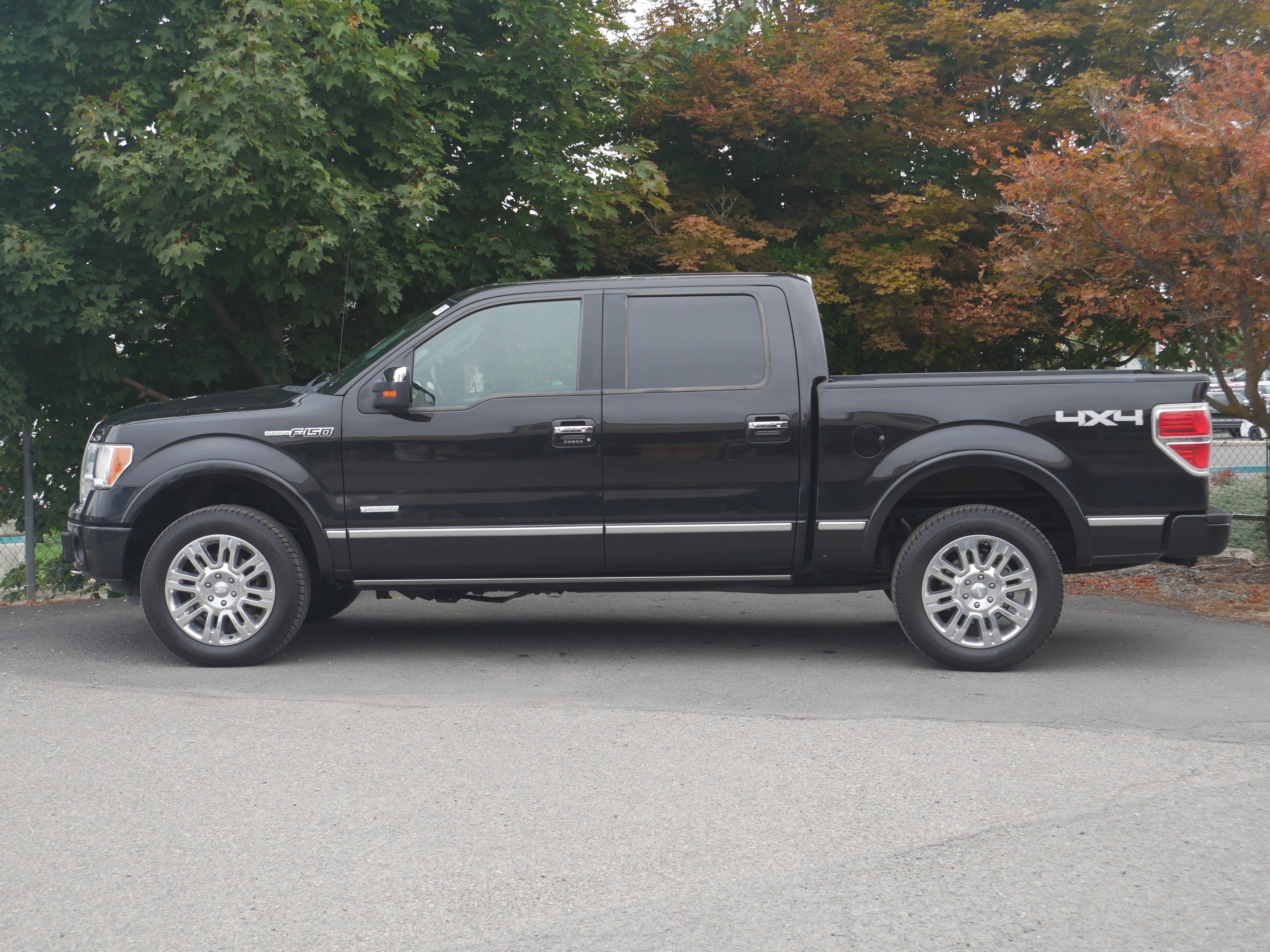 Used 2012 Tuxedo Black Metallic Ford Platinum image 22