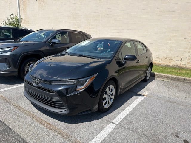 Used 2024 Black Toyota LE image 2
