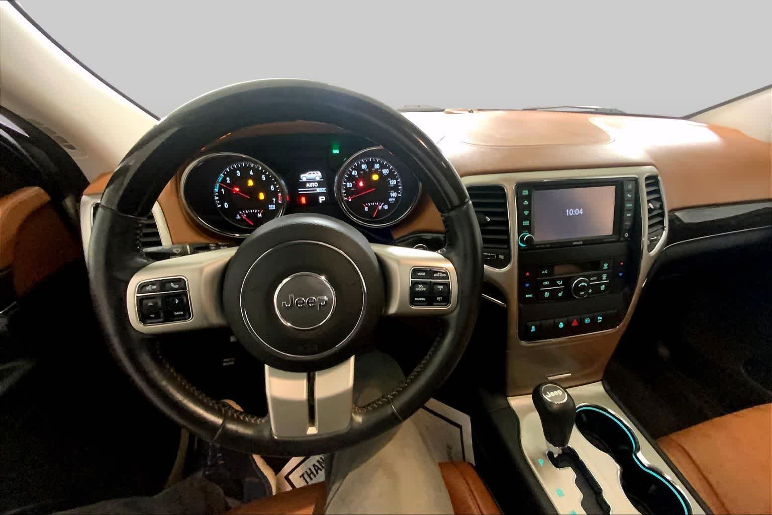 Used 2011 White Gold Jeep Overland Summit image 15