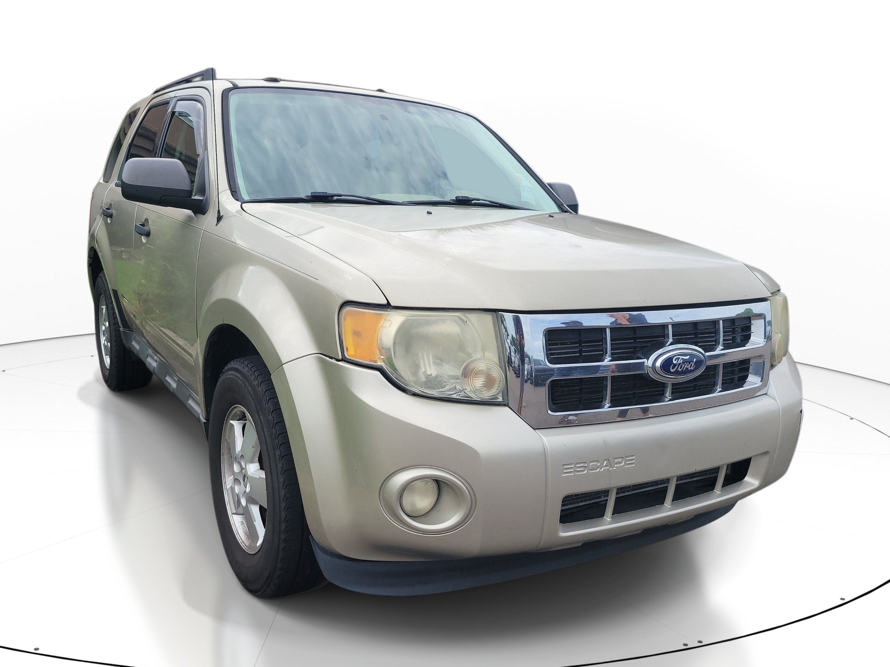 Used 2011 Gold Leaf Metallic Ford XLT image 1