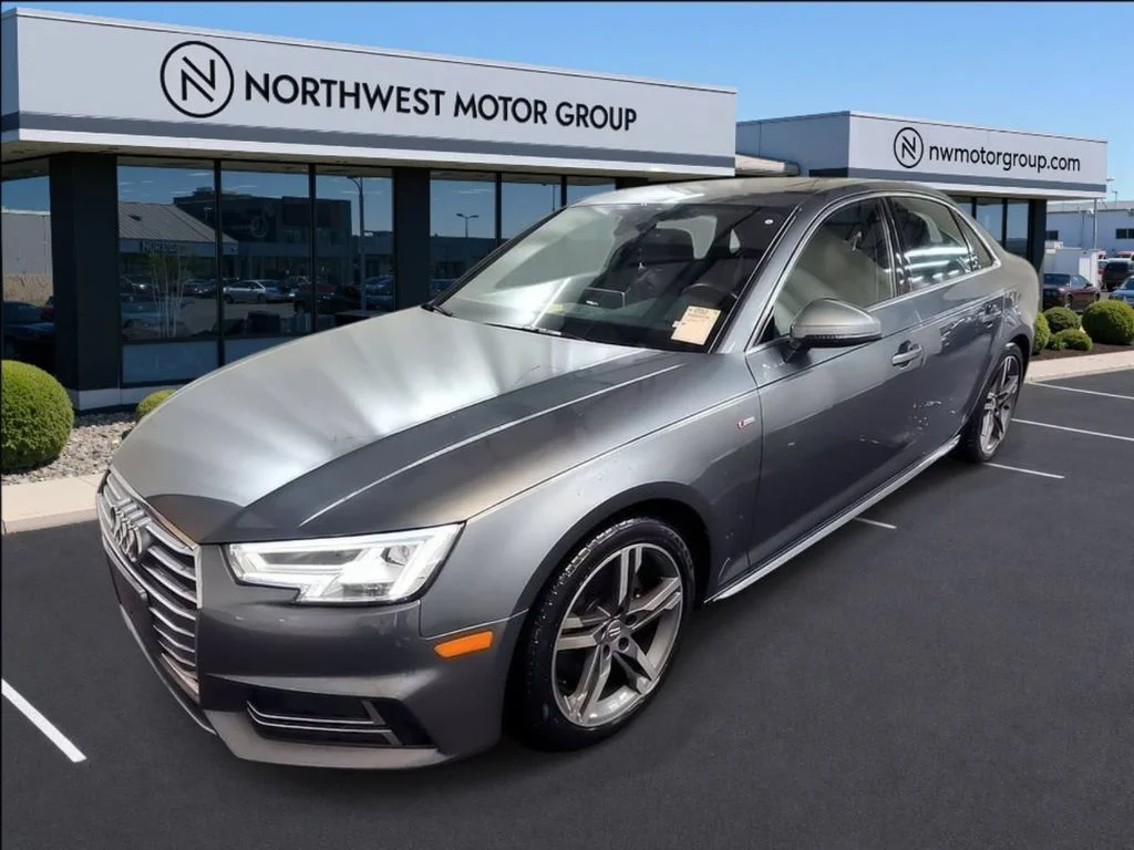 Used 2018 Monsoon Gray Metallic Audi Tech Premium Plus image 1