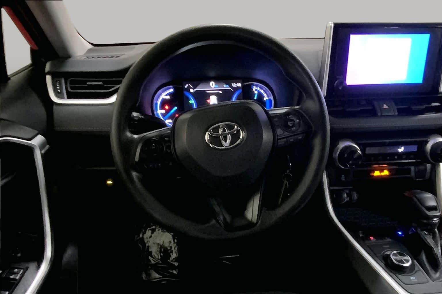 Used 2025 Midnight Black Metallic Toyota Hybrid LE image 6