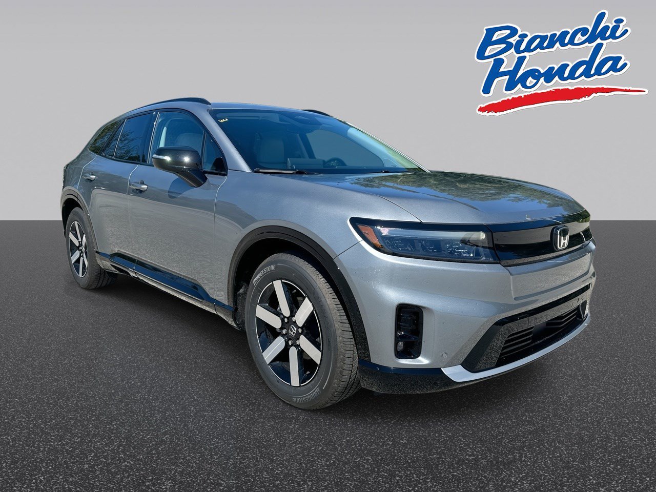 New 2026 Mercury Silver Metallic Honda AWD Touring image 1