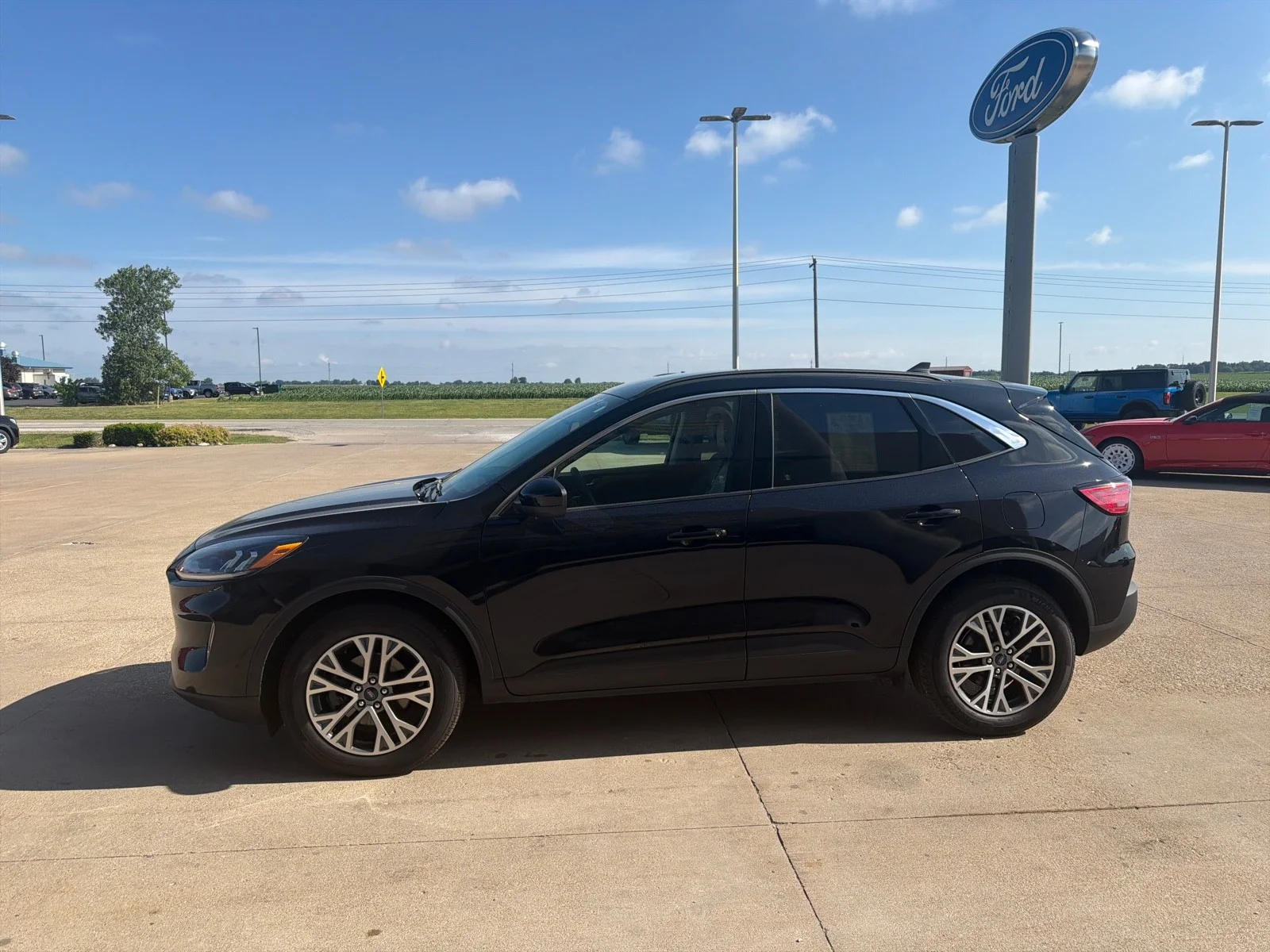 Used 2022 Agate Black Metallic Ford SEL image 4