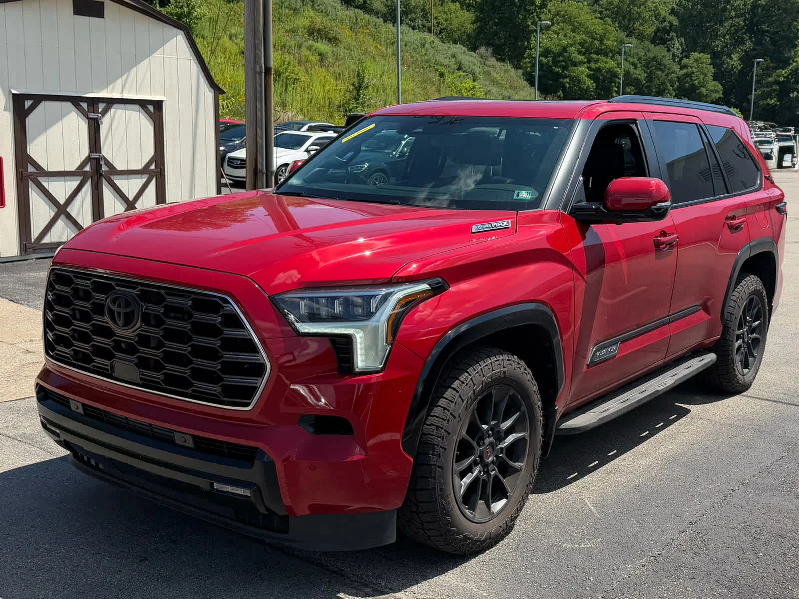 Used 2024 Supersonic Red Toyota Platinum image 2