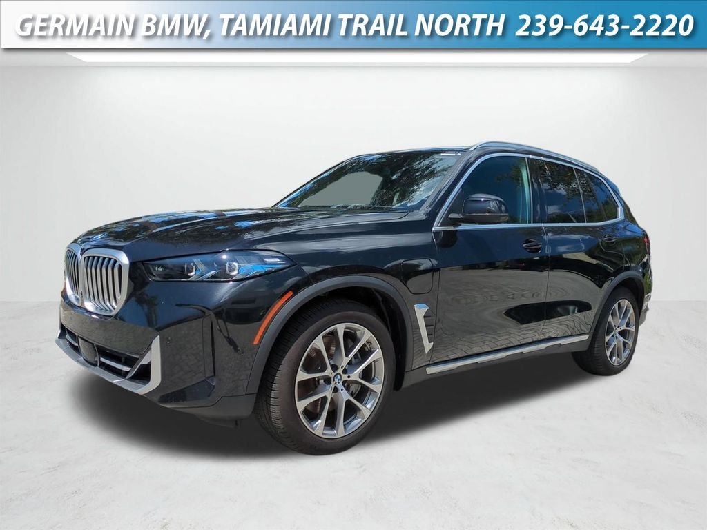 New 2026 Black Sapphire Metallic BMW xDrive50e image 1