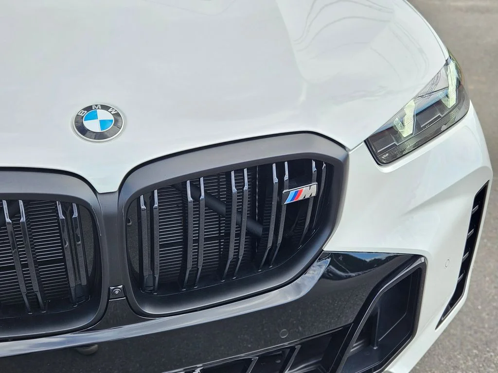 Used 2026 Mineral White Metallic BMW M60i image 10