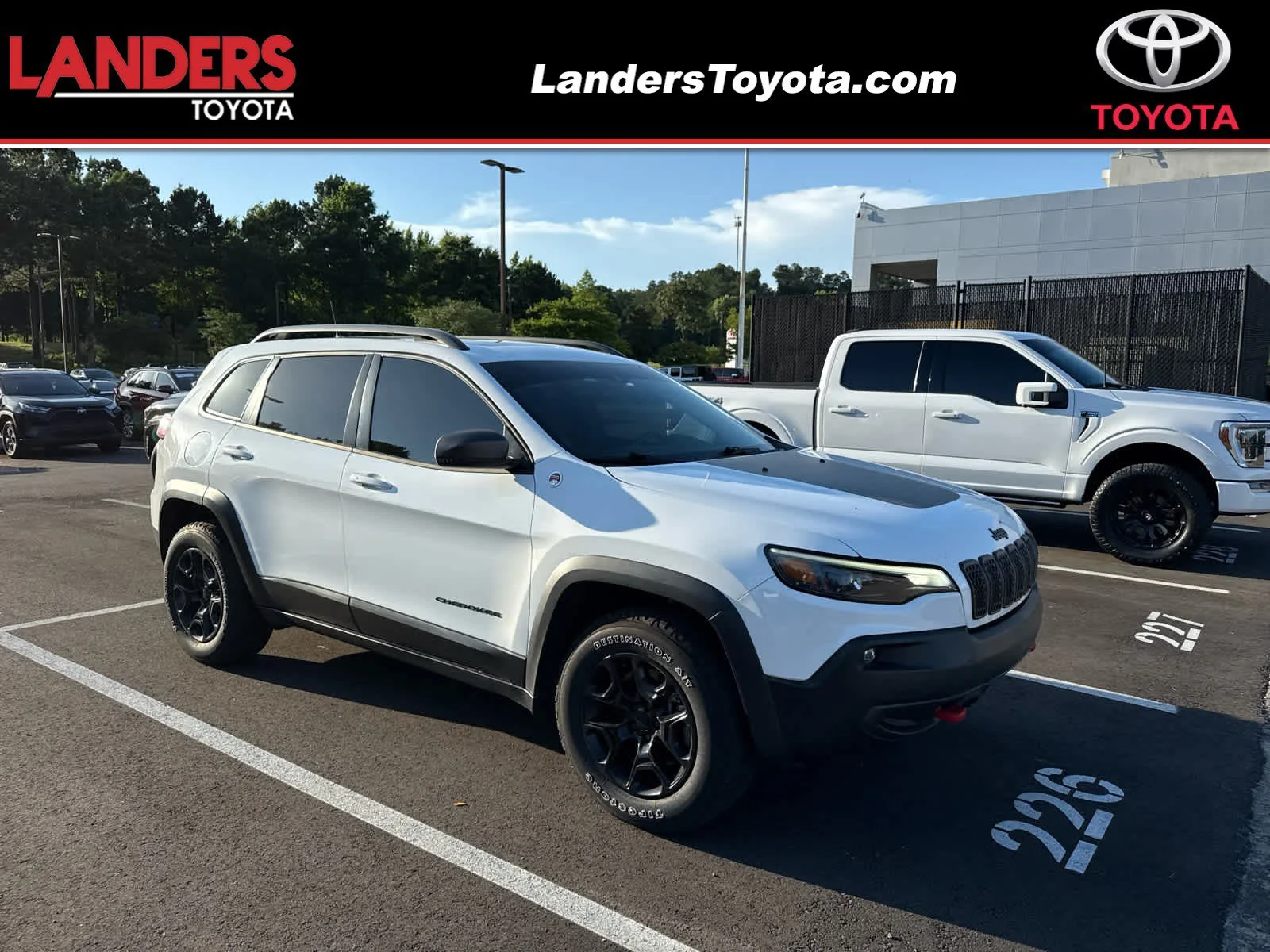 Used 2021 Bright White Clearcoat Jeep Trailhawk image 1