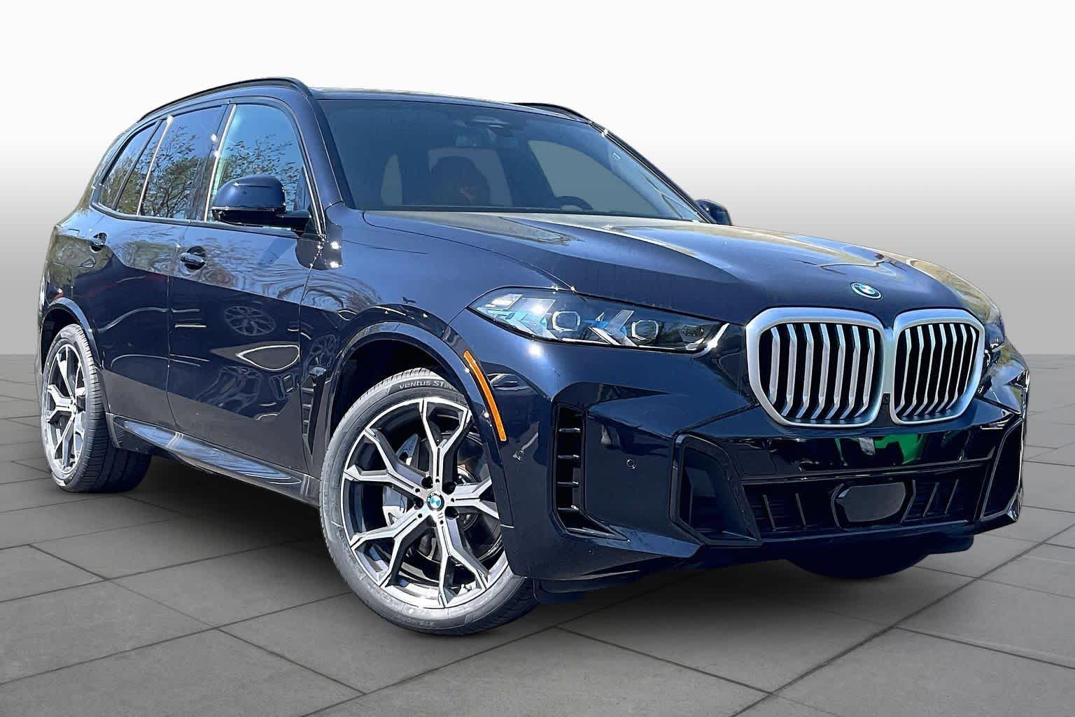 New 2026 Carbon Black Metallic BMW xDrive50e image 2