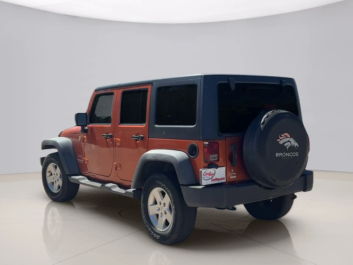 Used 2011 Orange Jeep UNLIMITED image 3