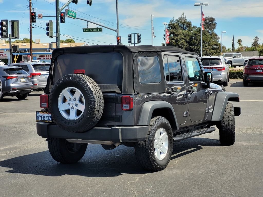 Used 2018 Gray Jeep Unlimited Sport image 4