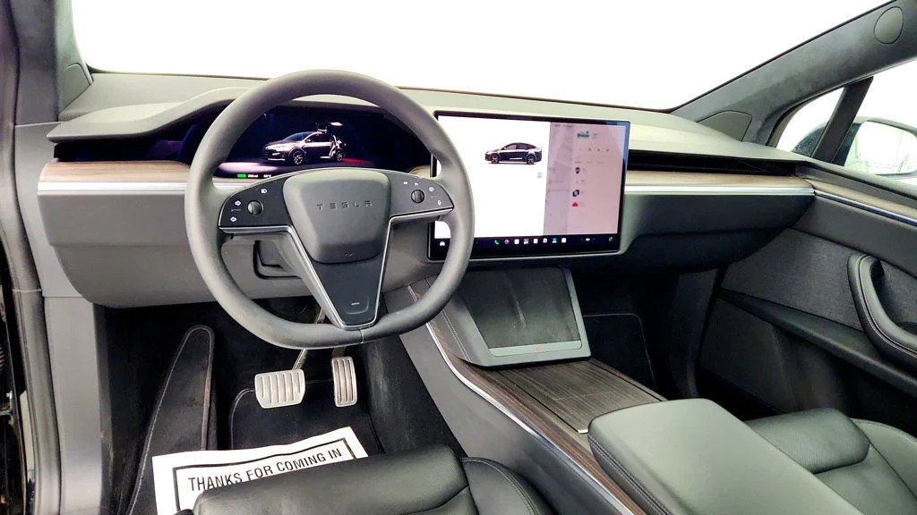 Used 2023 Solid Black Tesla AWD image 12