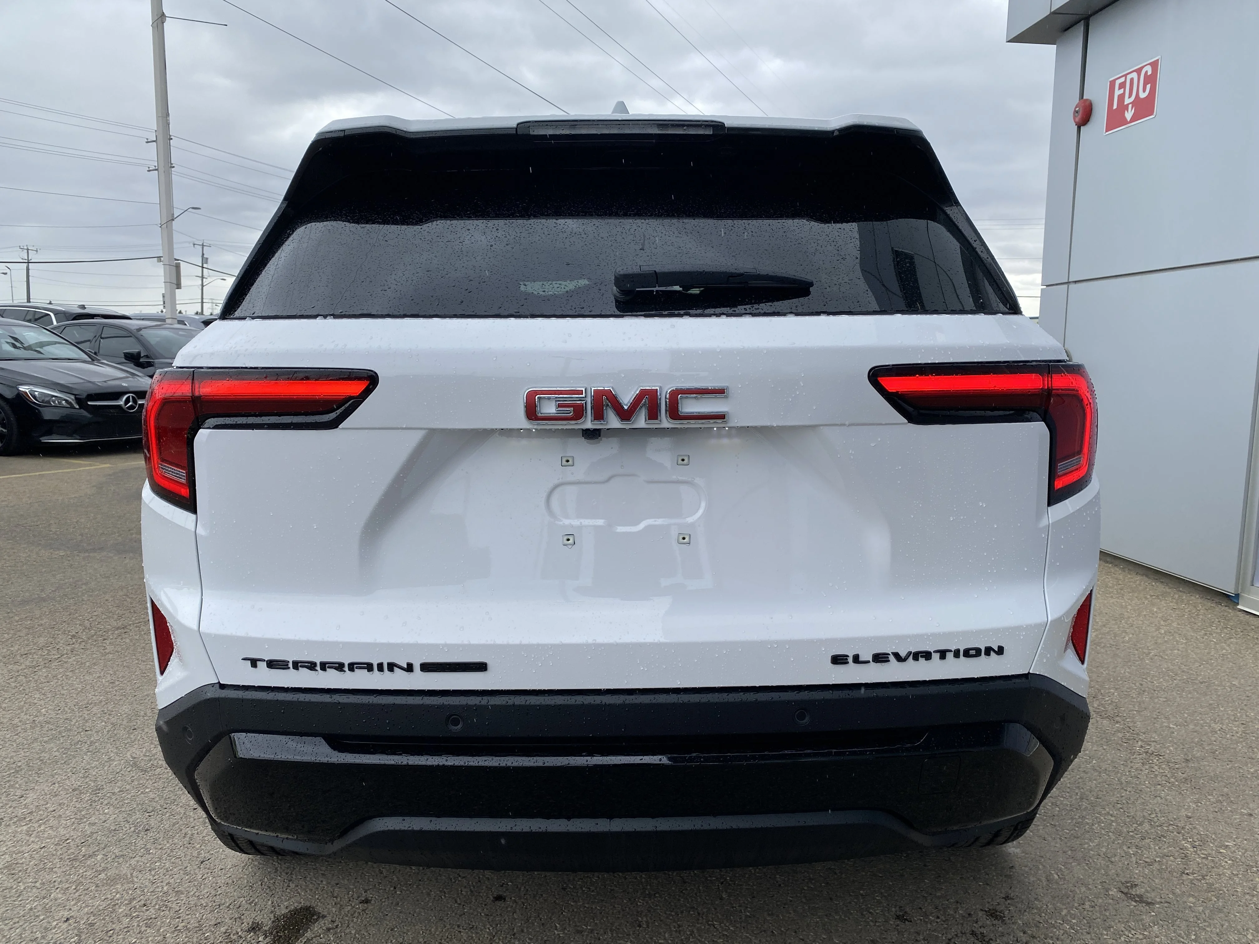New 2026 Summit White GMC AWD Elevation image 5