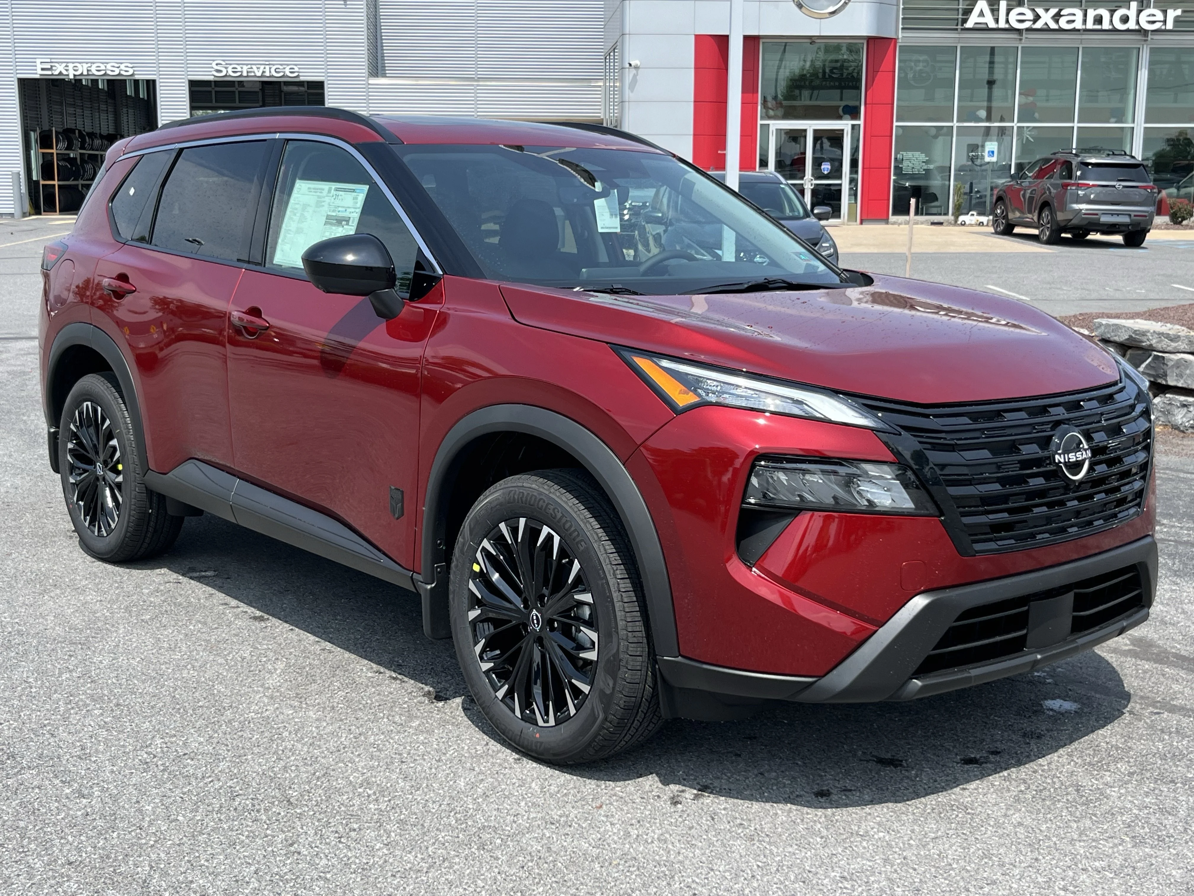 New 2026 Scarlet Ember Tintcoat Nissan Dark Armor™ image 1