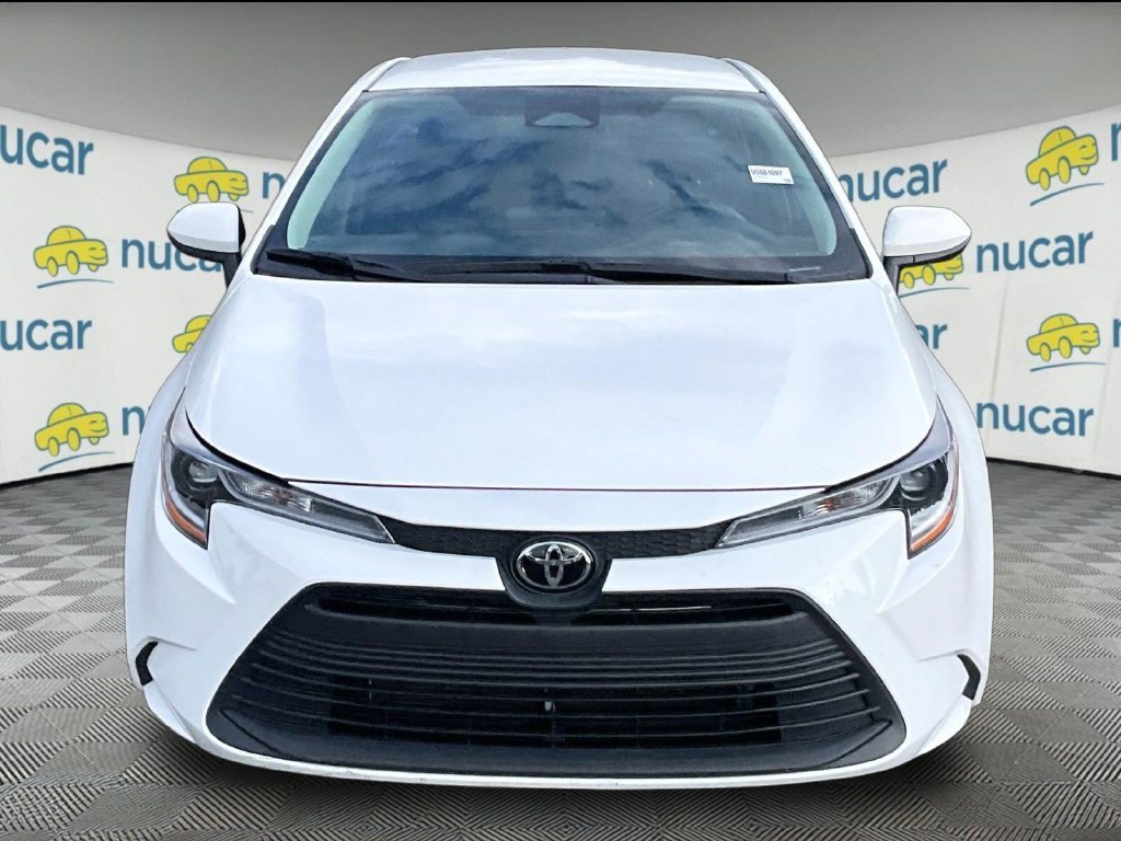 Used 2025 White Toyota LE image 2