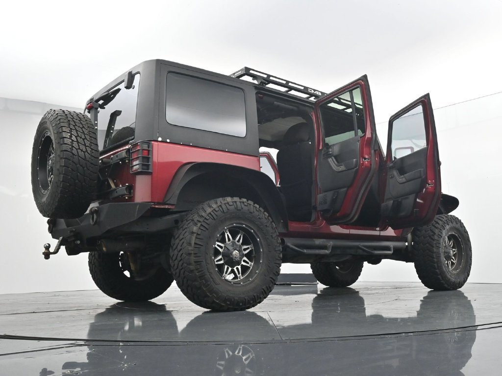 Used 2012 Red Jeep Unlimited Sport image 29