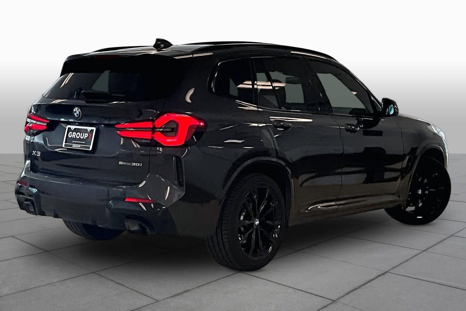 Used 2024 Dark Graphite Metallic BMW sDrive30i image 12