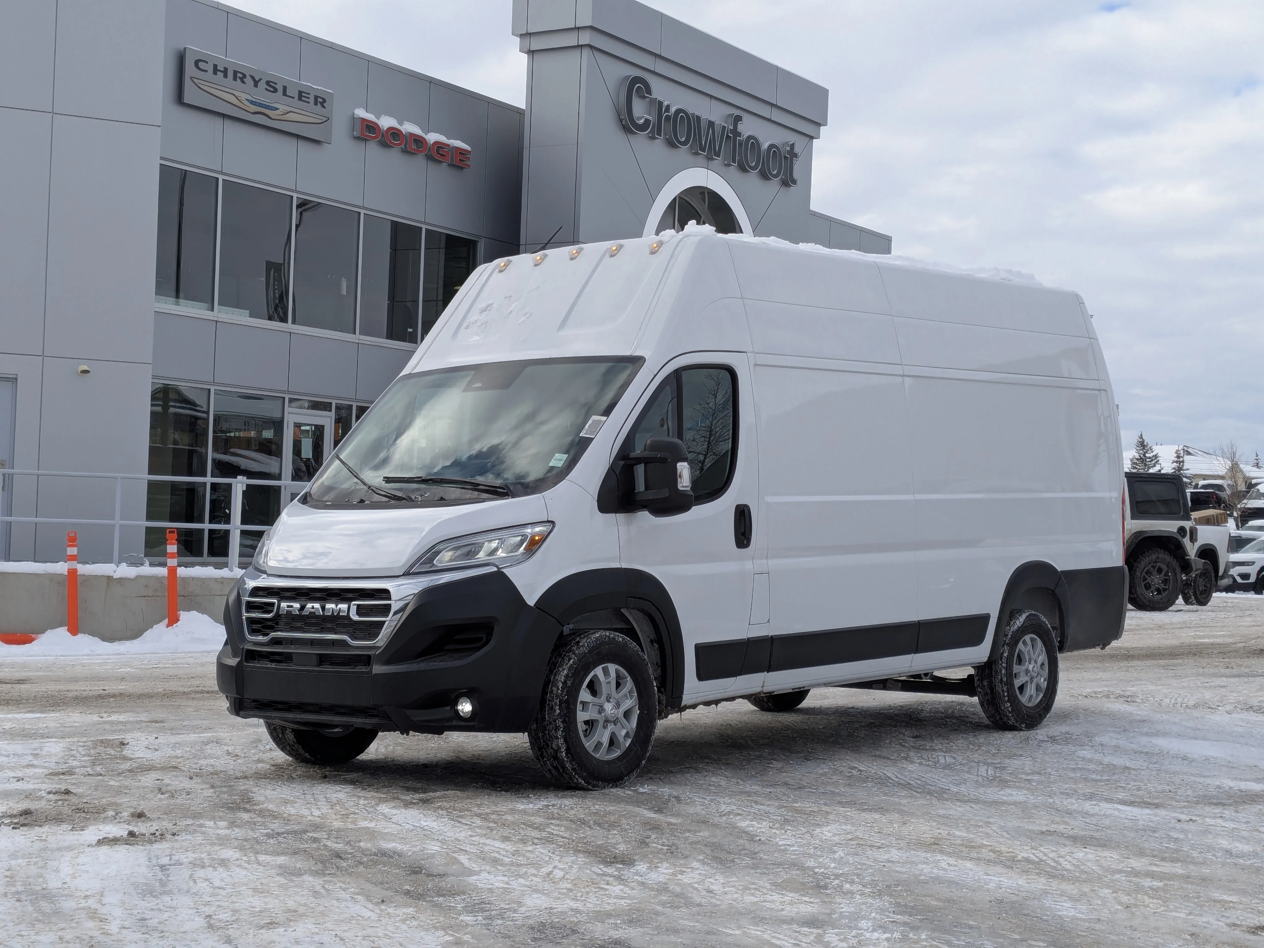 New 2026 White RAM SLT - - Super High Roof - Package 22G - LED Headlamps - Cargo Partition - Remote Start & tons more! image 1