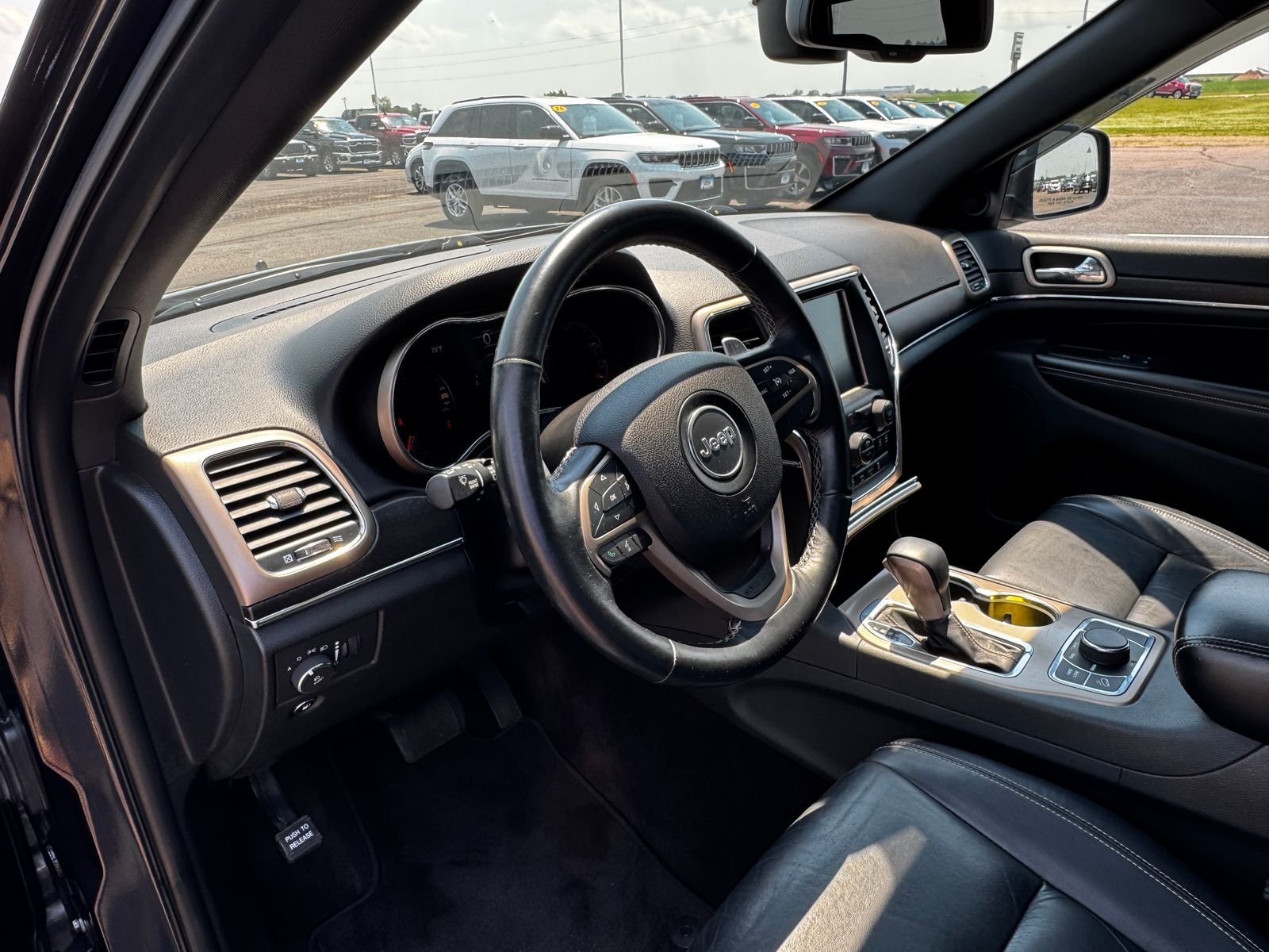 Used 2016 Steel Metallic JEEP Limited image 17
