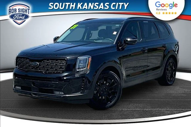 Used 2021 Ebony Black Kia SX image 1