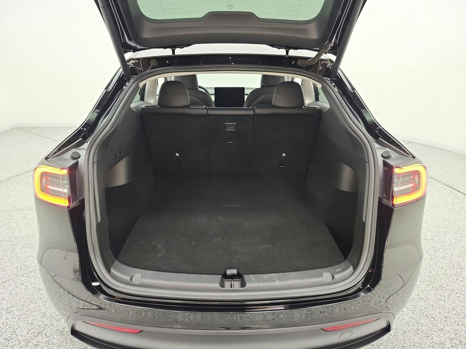 Used 2022 Solid Black Tesla Performance AWD image 18
