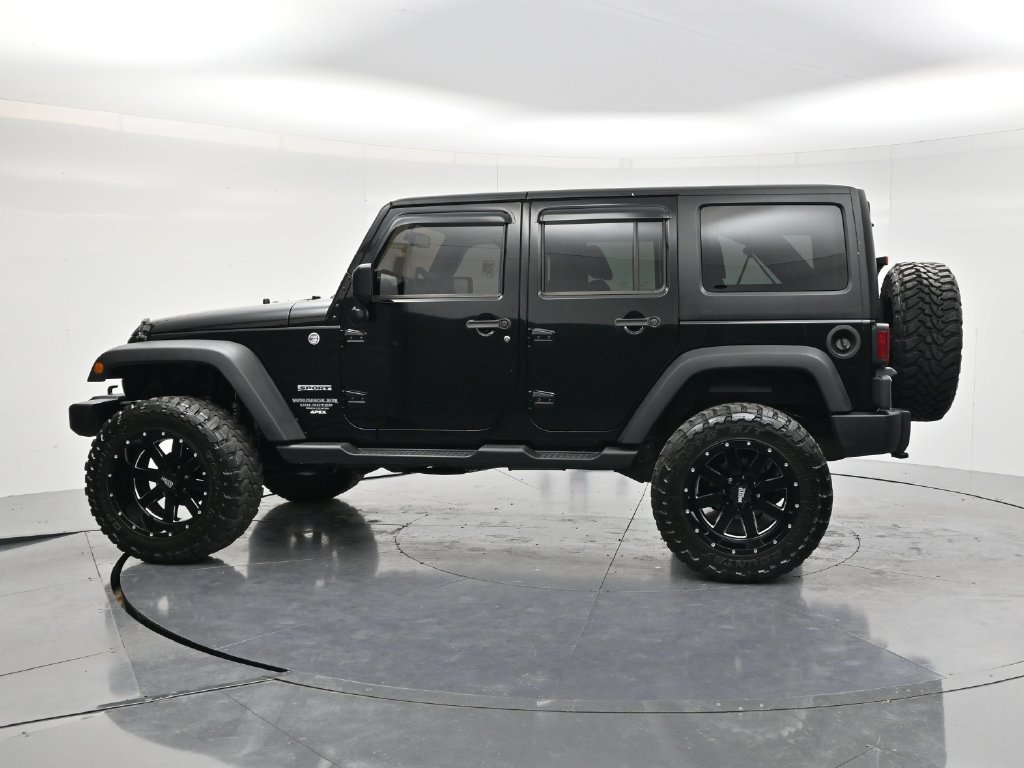 Used 2014 Black Clearcoat Jeep Unlimited Sport image 8