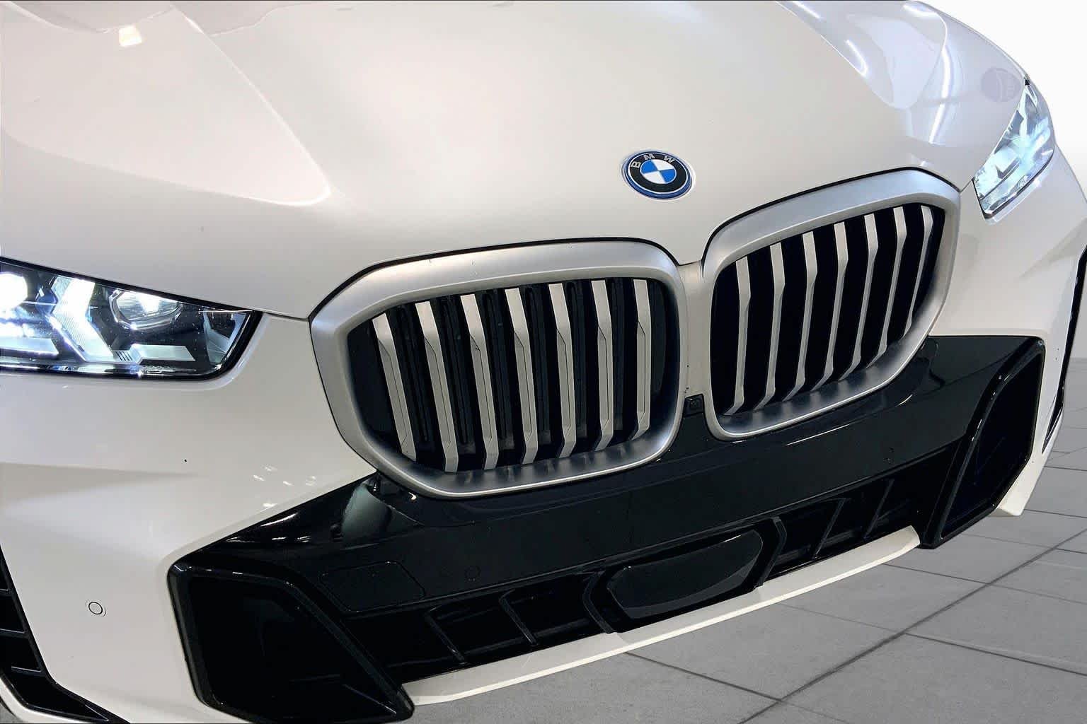 Used 2024 Mineral White Metallic BMW xDrive50e image 32