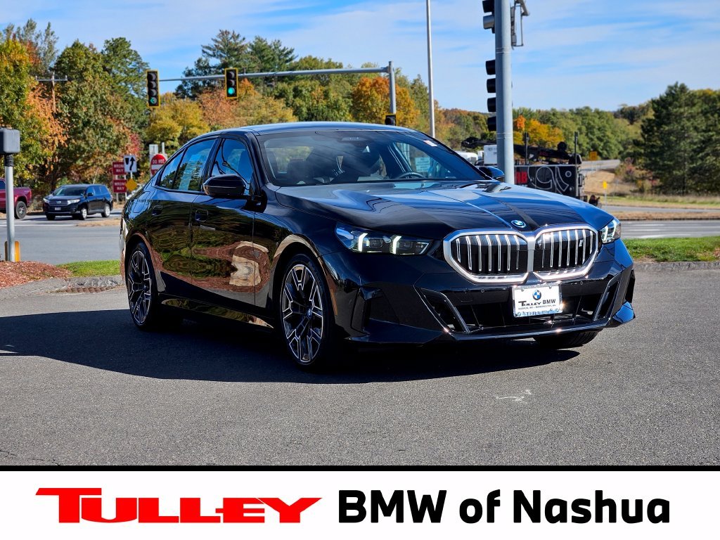 Certified Used 2025 Black Sapphire Metallic BMW xDrive40 image 1