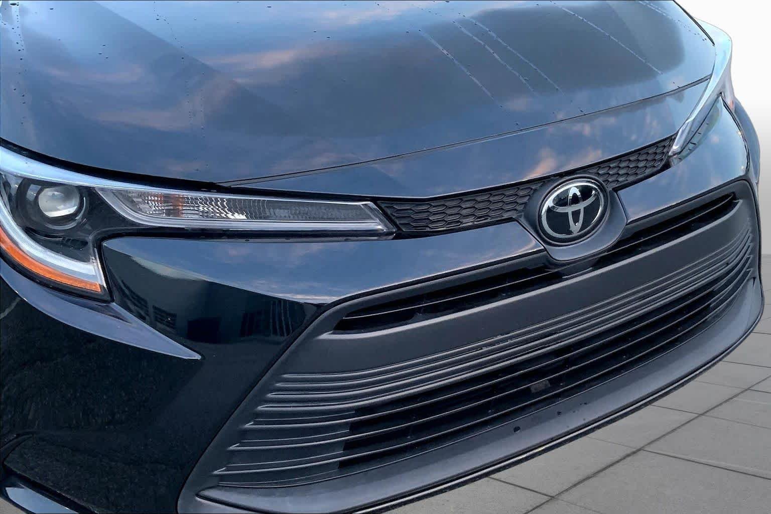 Used 2024 Midnight Black Metallic Toyota LE image 27