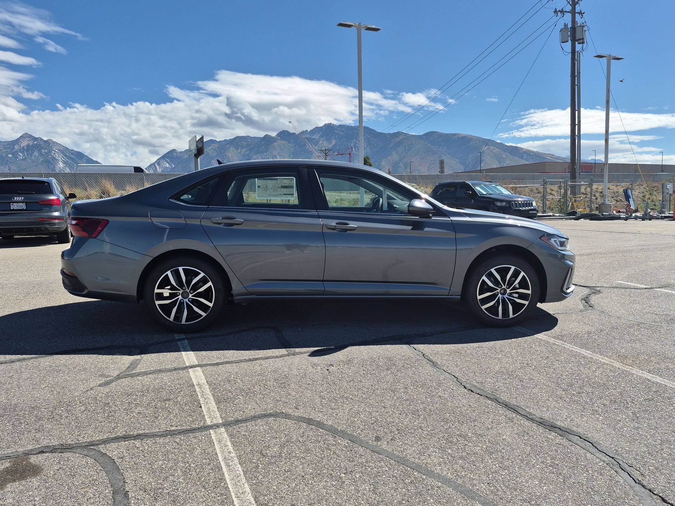 New 2027 Platinum Gray Metallic Volkswagen SE image 2