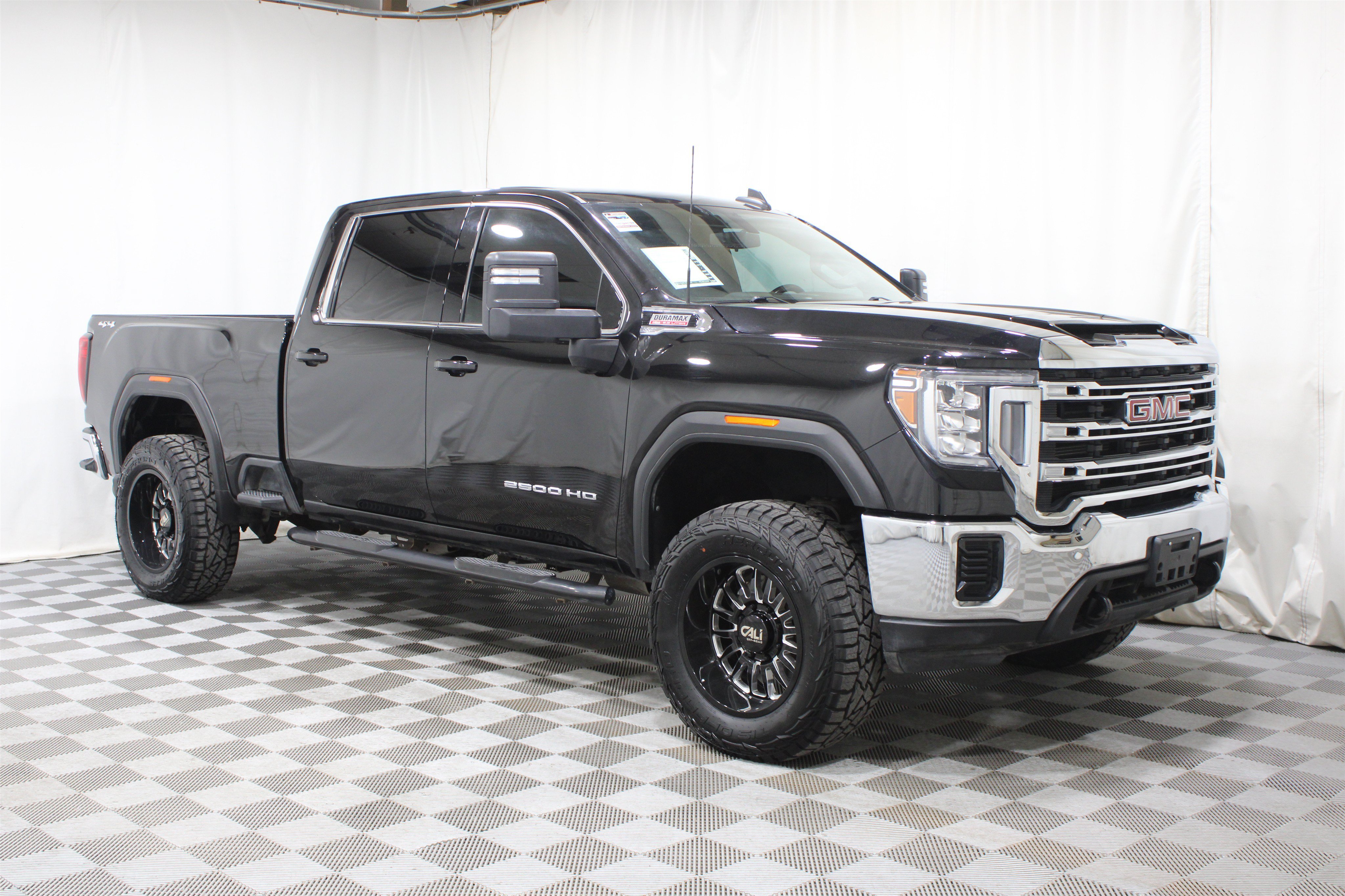 Used 2022 Black GMC SLE Crew Cab 4x4 - Lifted image 1