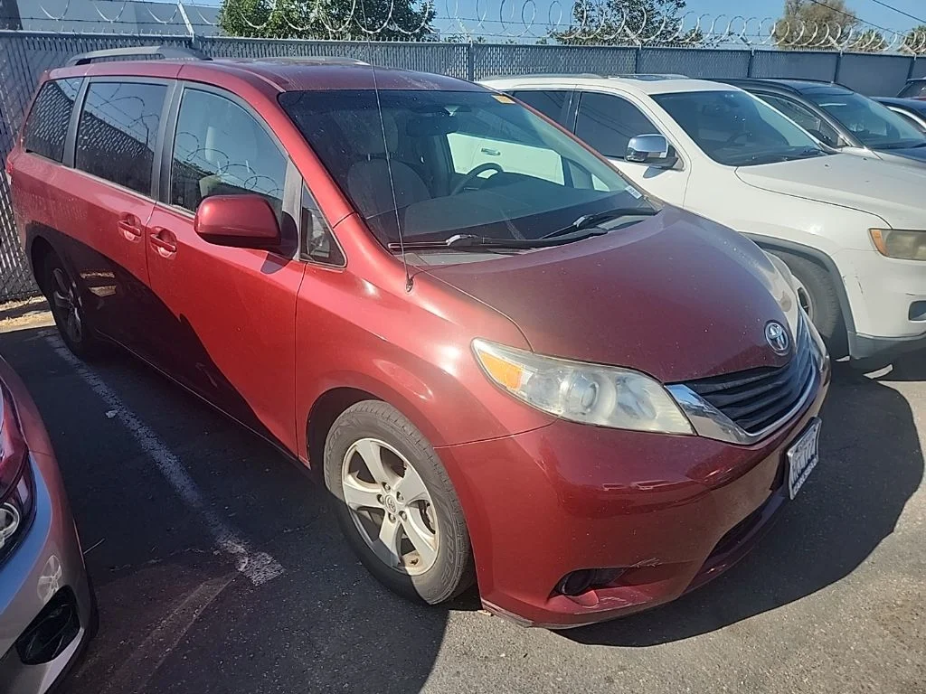 Used 2014 Red Toyota LE image 1