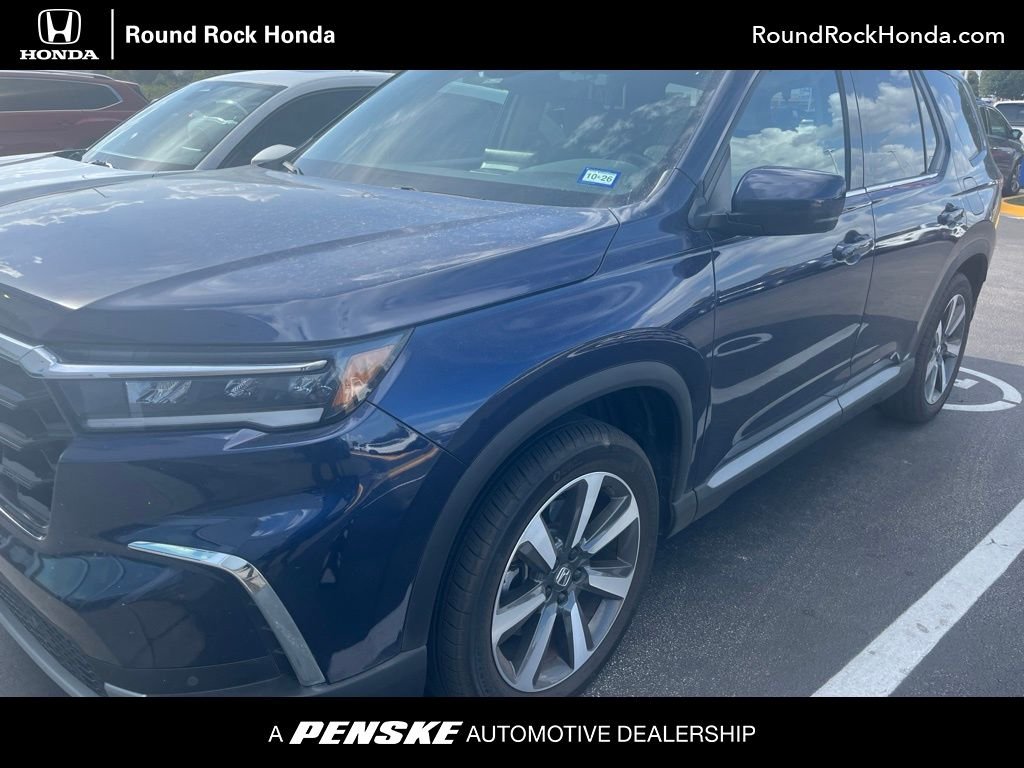 Used 2023 Obsidian Blue Pearl Honda Touring image 1