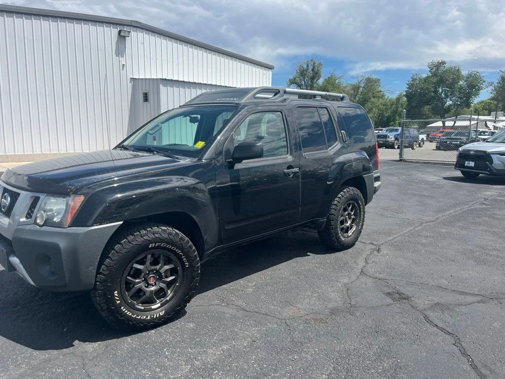 Used 2015 Super Black Nissan X image 2