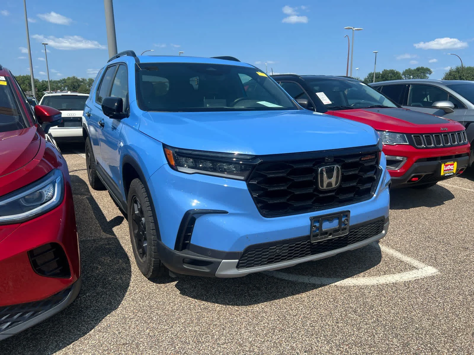 Used 2025 Honda Pilot TrailSport with VIN 5FNYG1H63SB040574 for sale in Brooklyn Center, Minnesota