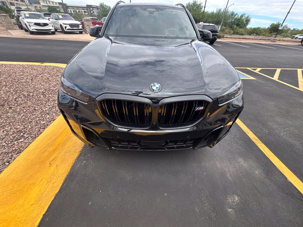 Certified Used 2026 Black Sapphire Metallic BMW M60i image 2