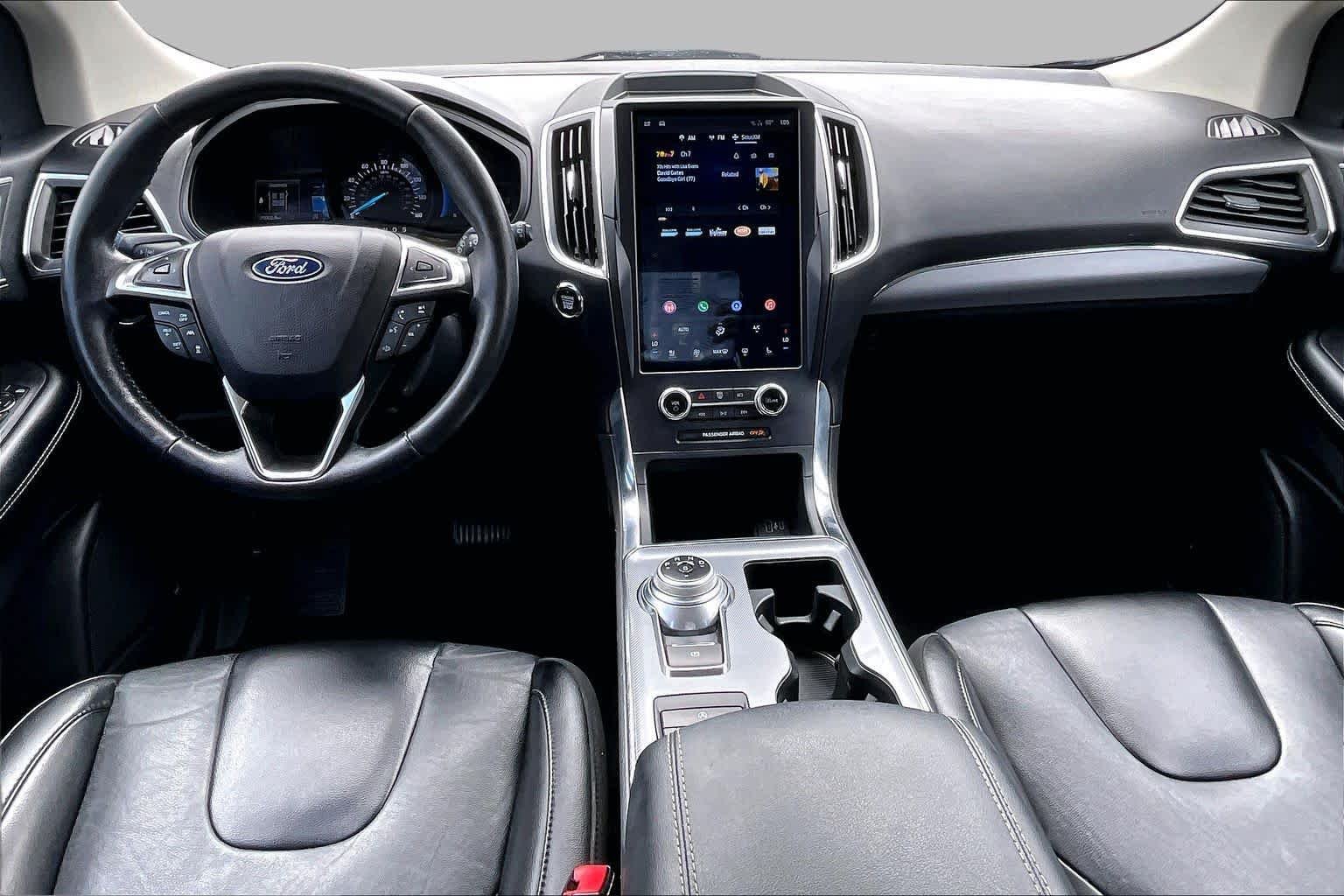 Used 2022 Agate Black Metallic Ford Titanium image 16