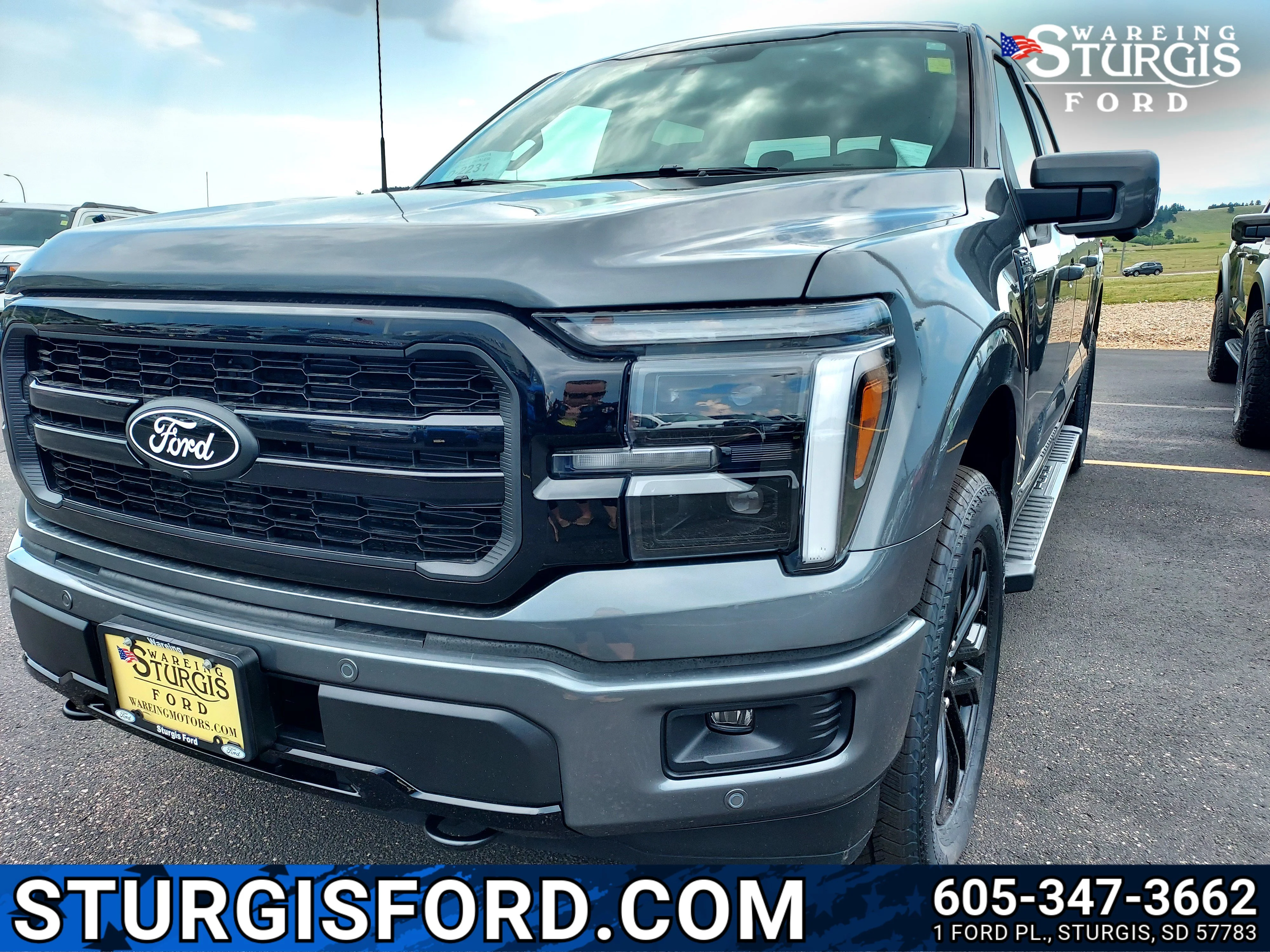 New 2026 Carbonized Gray Metallic Ford LARIAT image 1