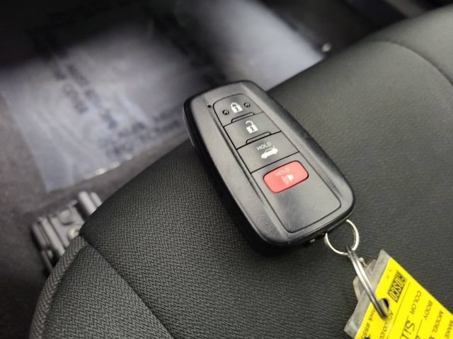 Used 2024 Celestial Silver Metallic Toyota LE image 31