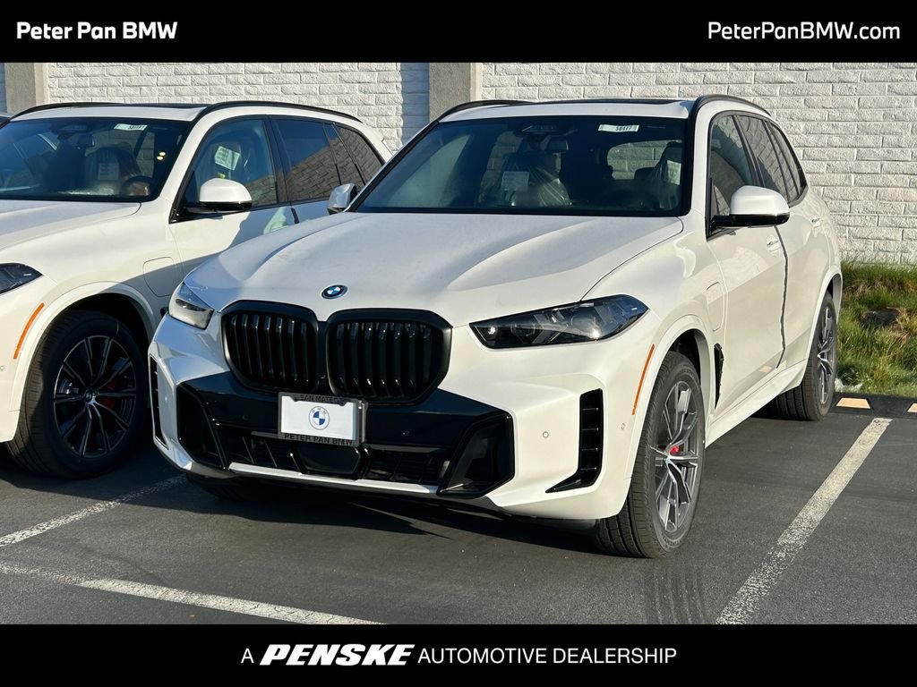 New 2026 Mineral White Metallic BMW xDrive50e image 1