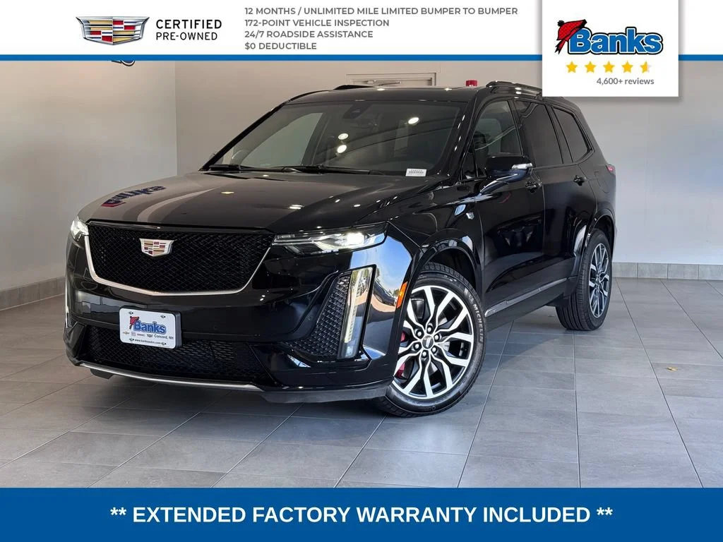 Certified Used 2025 Stellar Black Metallic Cadillac Sport image 1