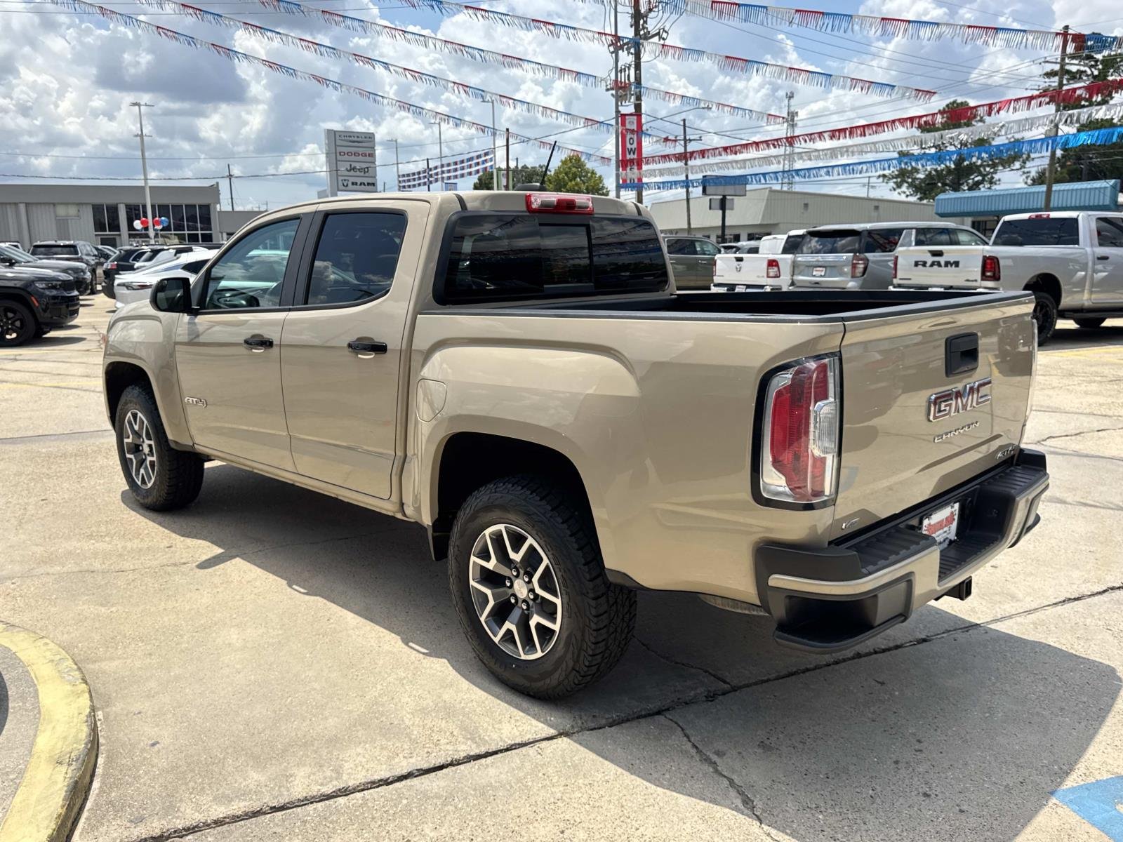 Used 2022 Desert Sand Metallic GMC 4WD AT4 w/Cloth image 5