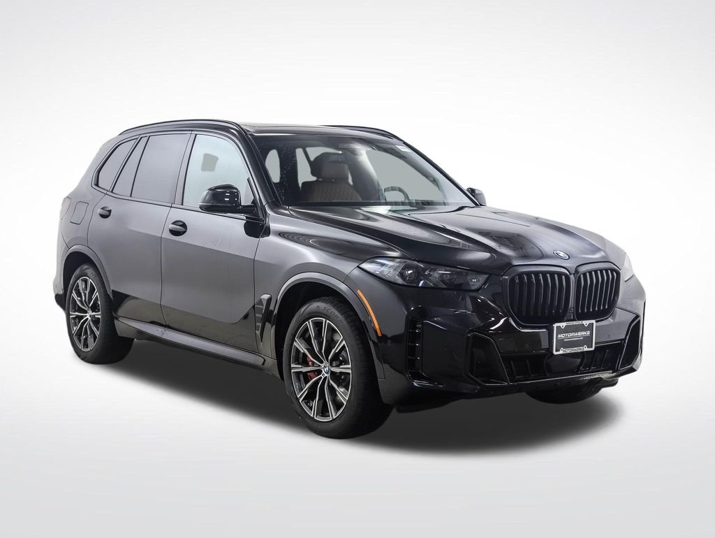 New 2026 Black Sapphire Metallic BMW xDrive50e image 7