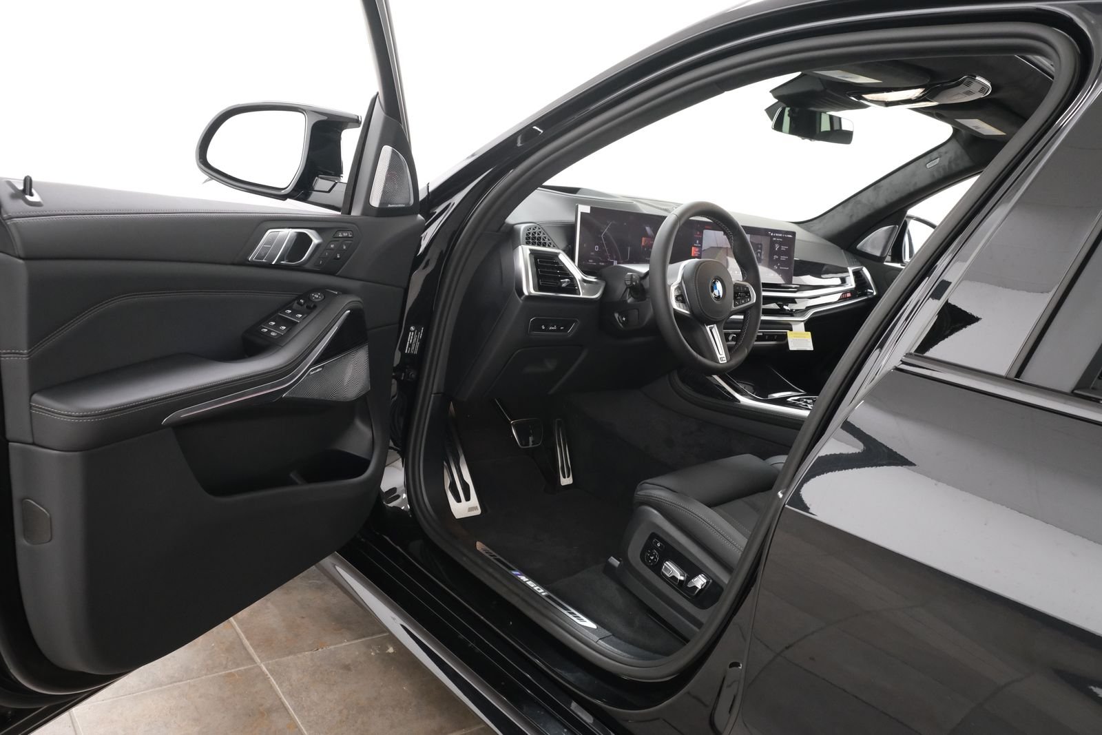 New 2027 Black Sapphire Metallic BMW M60i image 24