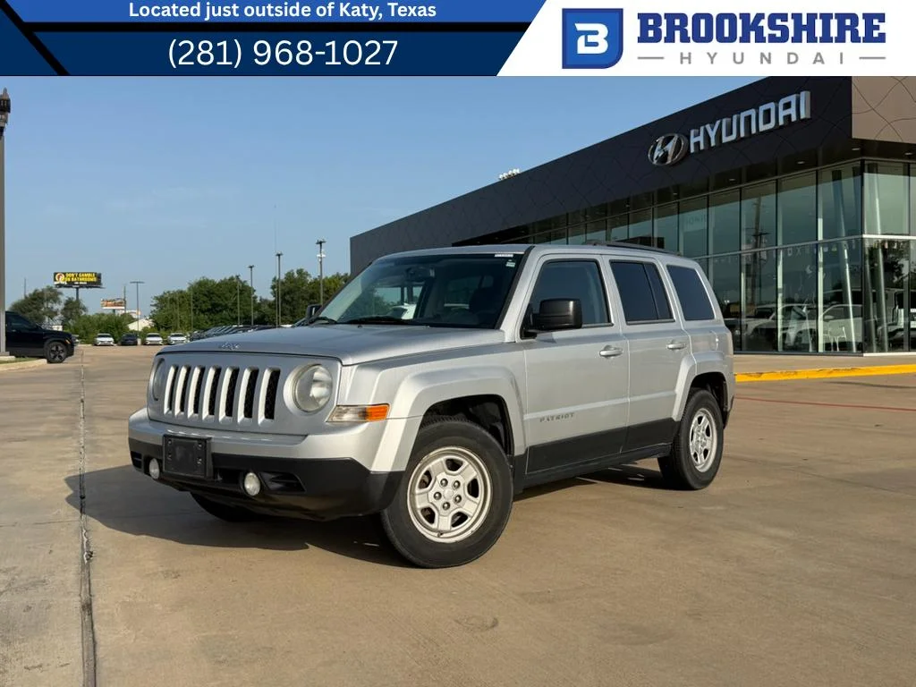 Used 2011 Bright Silver Metallic Clearcoat Jeep Sport image 1