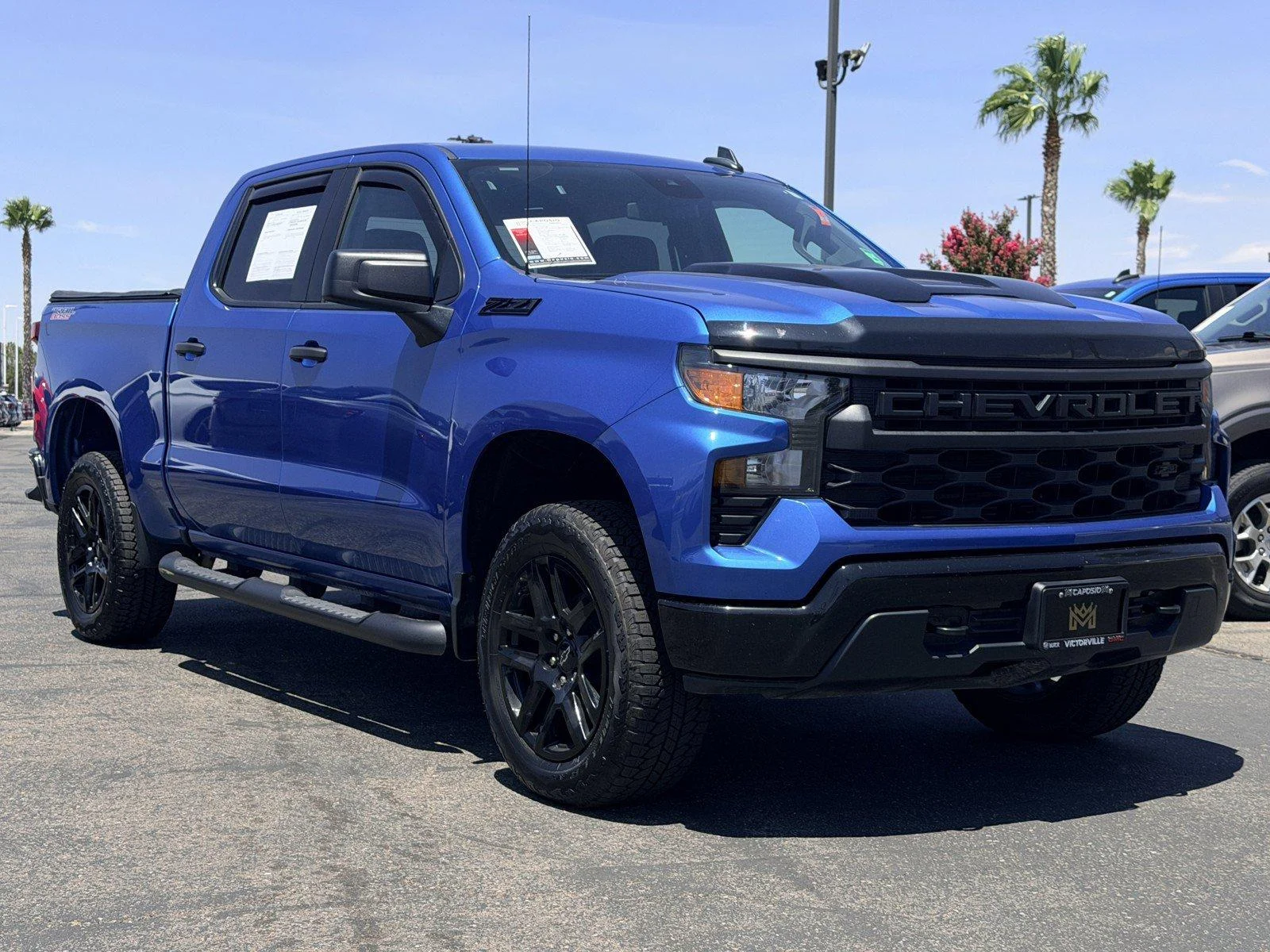 Used 2024 Glacier Blue Metallic Chevrolet Custom Trail Boss image 1